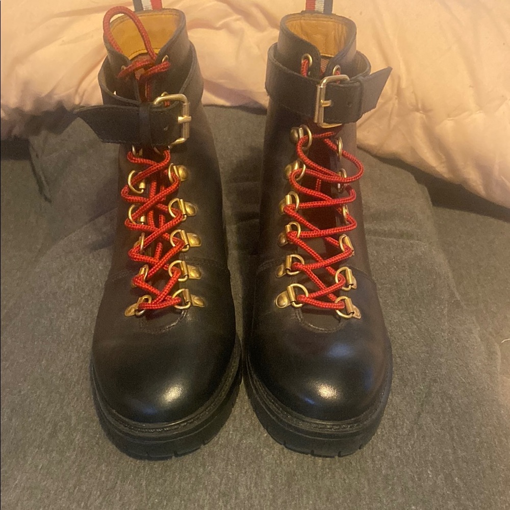 Urban outfitters Black Leather Ankle Boots with Red Laces size 7. Never worn.